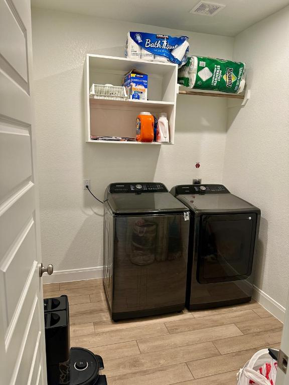 1113 Scenic Grn Loop Georgetown, TX 78628 - Photo 20 of 38 a utility room with dryer and washer