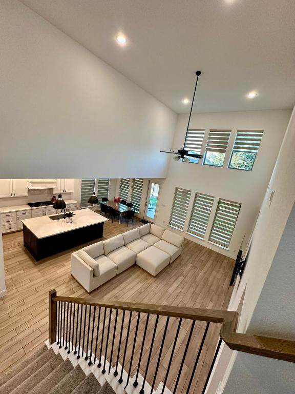 1113 Scenic Grn Loop Georgetown, TX 78628 - Photo 21 of 38 a living room with furniture and wooden floor