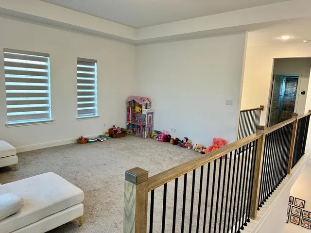 a view of livingroom with furniture and stairs
