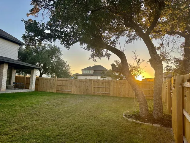 a view of a yard in front of house