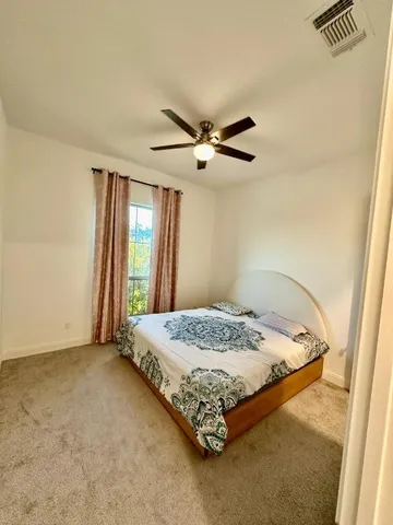 a room with furniture and window