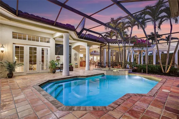 a building outdoor space with patio couch and potted plant