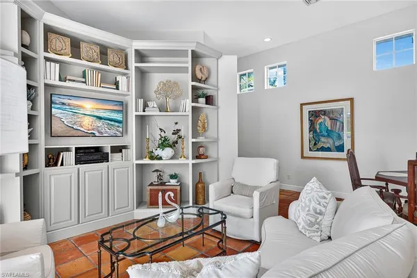 a view of a living room and dining room