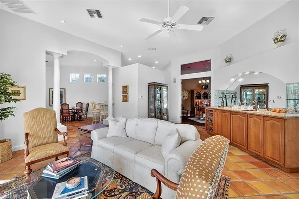 a room with a furniture and a window