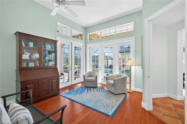 a spacious bathroom with a double vanity sink and a large mirror