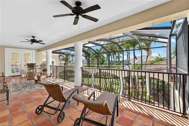 a view of a house with backyard and porch