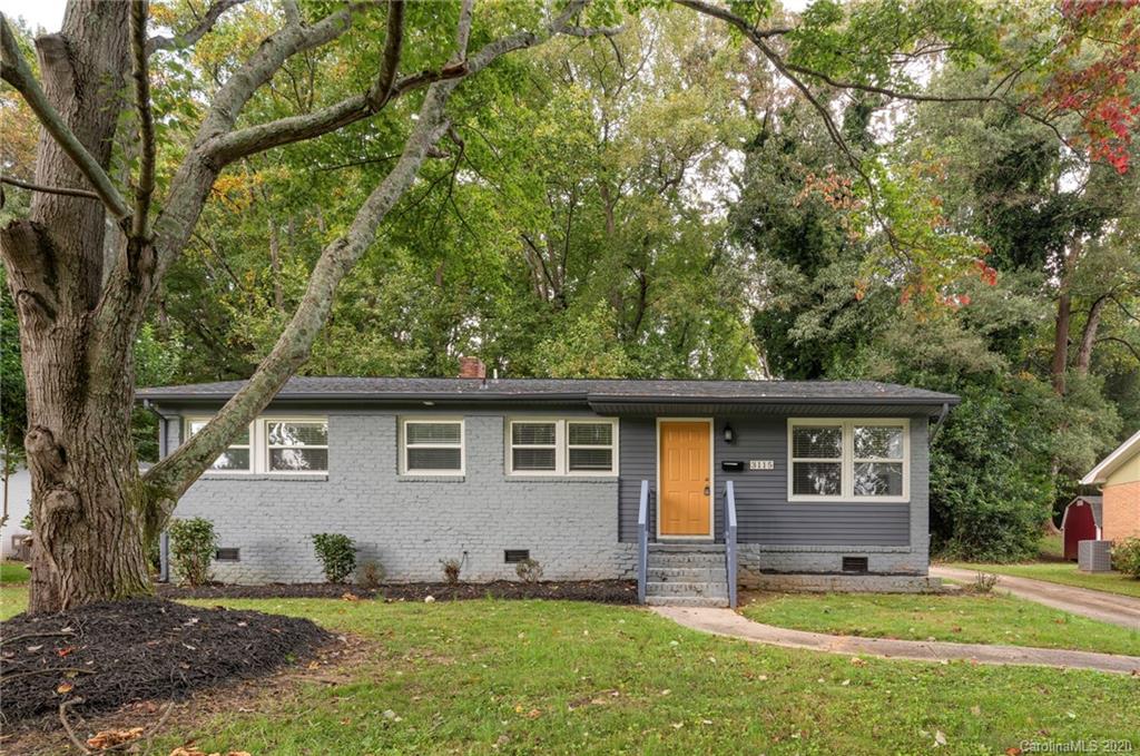 3115 Sudbury Road Charlotte, NC 28205 - Photo 2 of 17 front view of a house with a yard