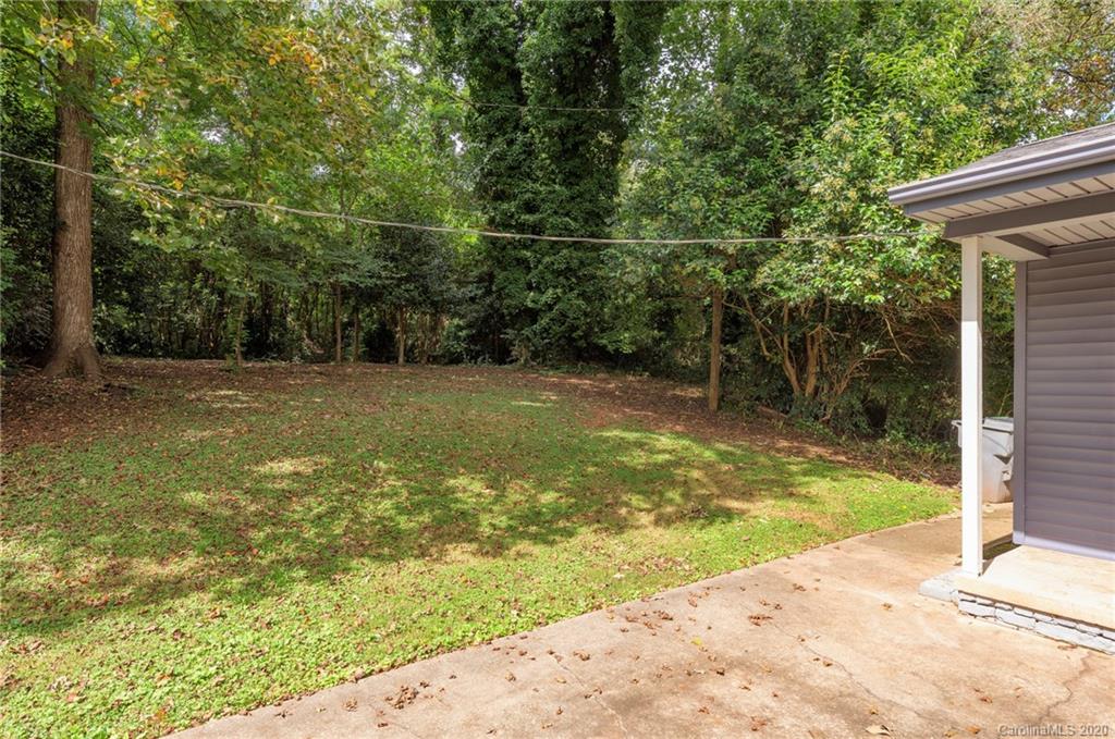 3115 Sudbury Road Charlotte, NC 28205 - Photo 17 of 17 a view of a yard with an outdoor space