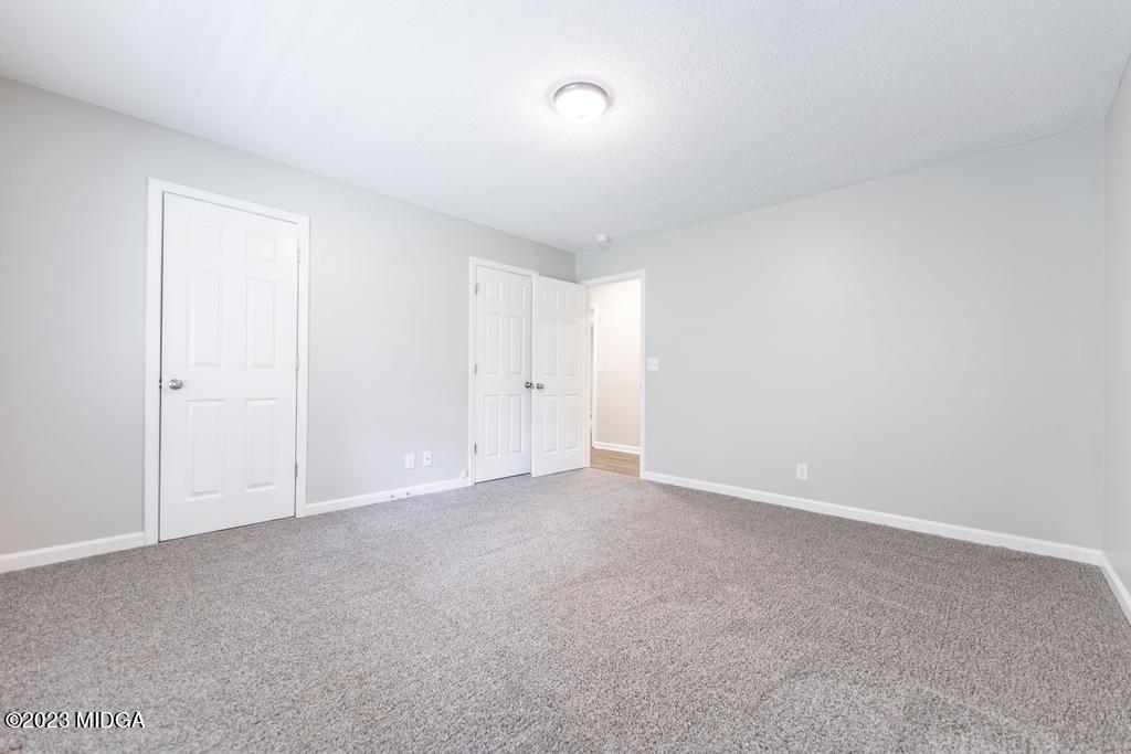 1734 Dixon Road Roberta, GA 31078 - Photo 23 of 40 a view of an empty room and a window