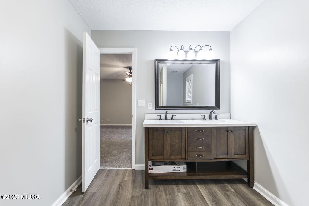 1734 Dixon Road Roberta, GA 31078 - Photo 29 of 40 a bathroom with a sink and a mirror