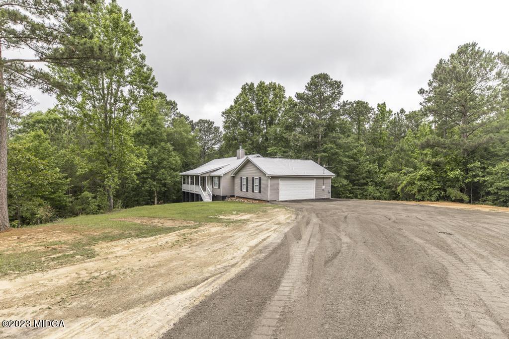 1734 Dixon Road Roberta, GA 31078 - Photo 3 of 40 a view of a house with a yard
