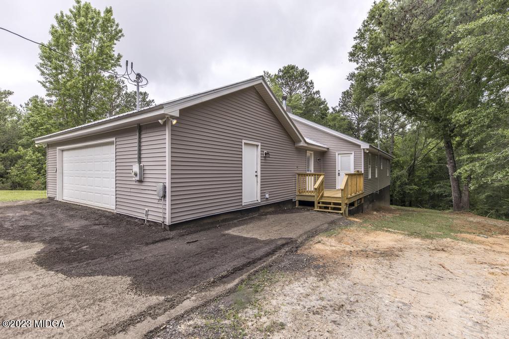 1734 Dixon Road Roberta, GA 31078 - Photo 32 of 40 a view of a house with a yard