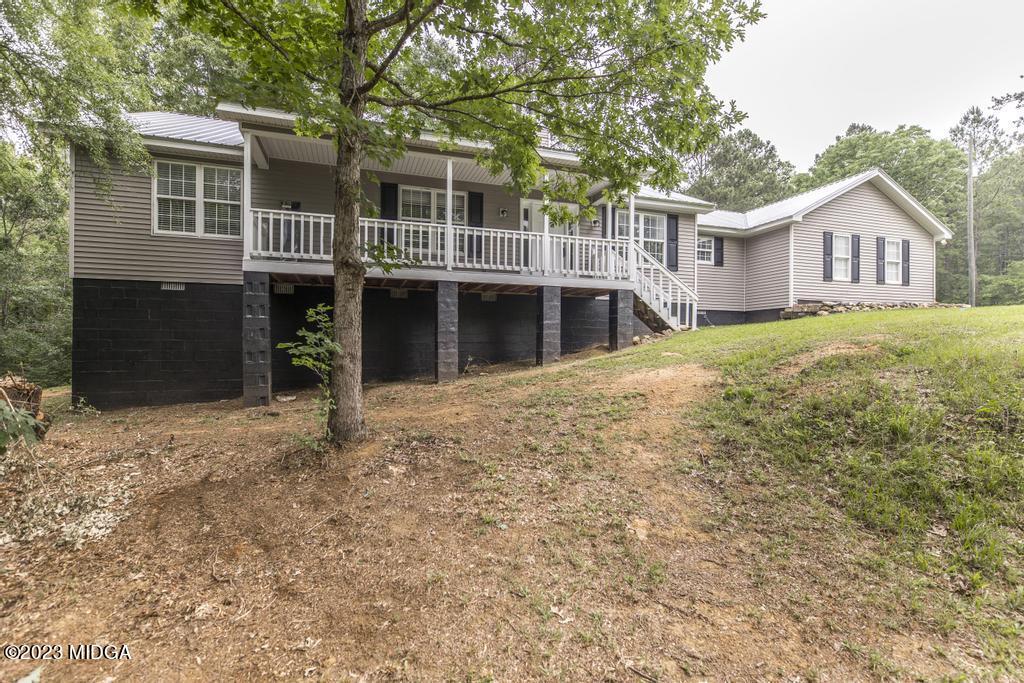 1734 Dixon Road Roberta, GA 31078 - Photo 5 of 40 a view of a house with a yard