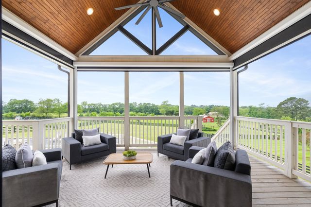 a close view of a sink a stove and a microwave