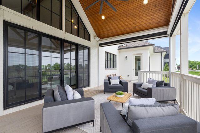 a kitchen with stainless steel appliances a sink stove and cabinets