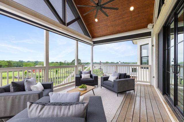 a view of a bathroom with a tub and a sink
