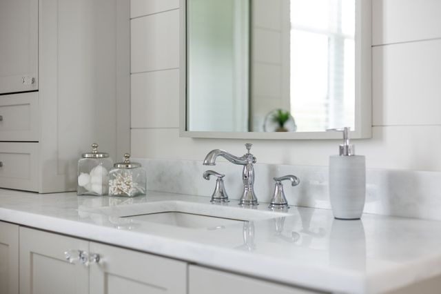 a living room with stainless steel appliances kitchen island granite countertop furniture and a kitchen view