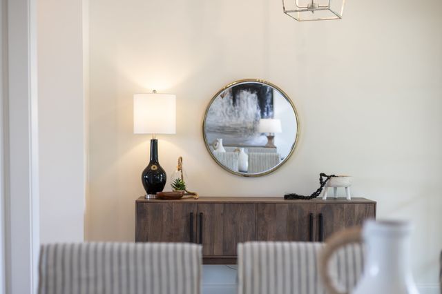 a vase of flowers sitting on a table