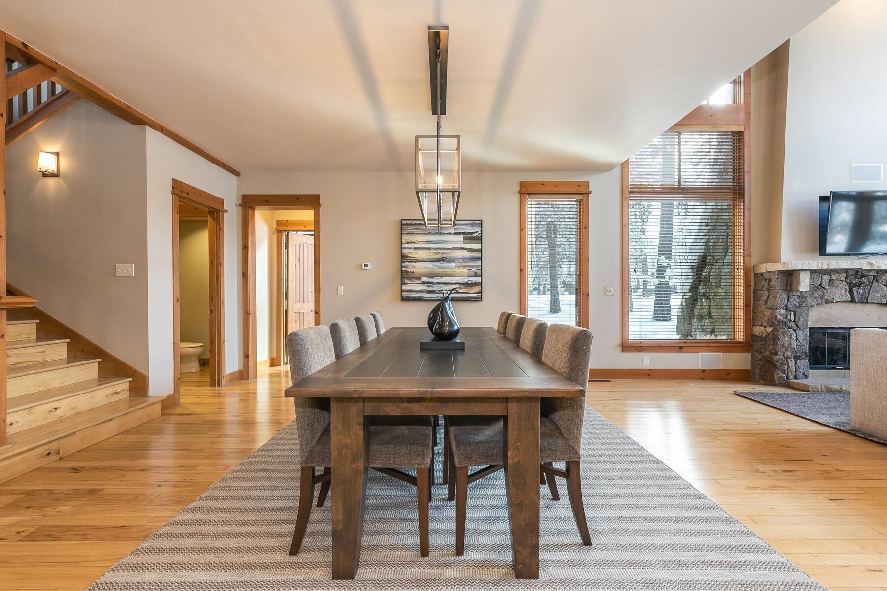 12193 Lookout Loop, Unit F0301 Truckee, CA 96161 - Photo 8 of 26 a view of a a dining room with furniture window and wooden floor