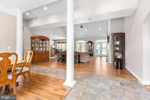 a living room with furniture fireplace and flat screen tv