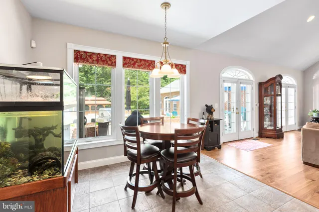 a bathroom with a toilet and a shower curtain