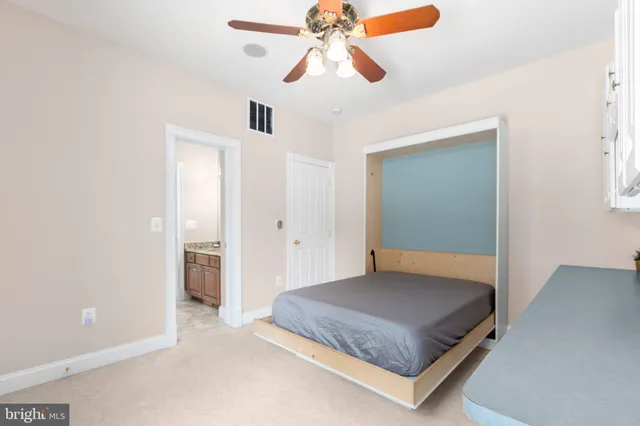 a room with pool table and a flat screen tv