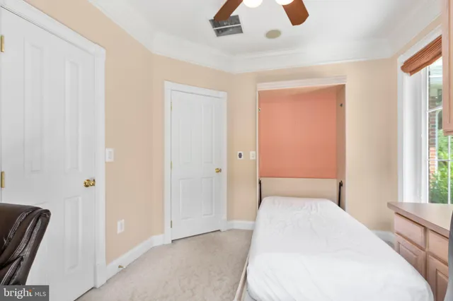 a white toilet sitting next to a bath tub