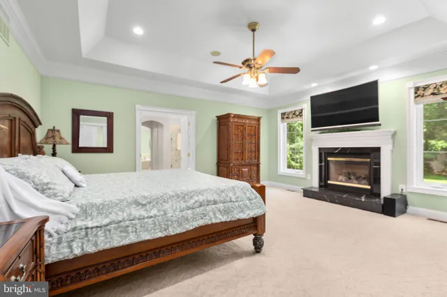 a view of a swimming pool with a yard