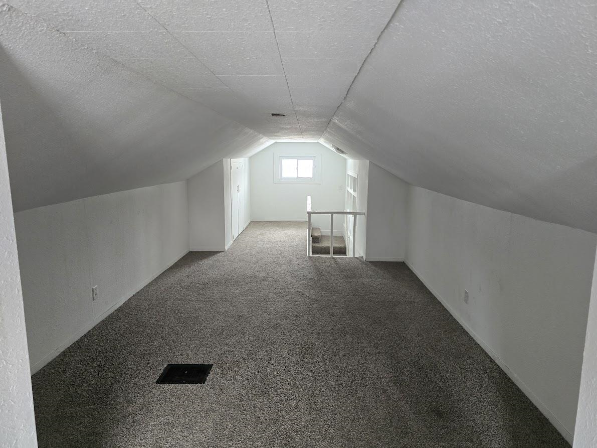 2103 North Court Street Rockford, IL 61103 - Photo 10 of 14 a view of a livingroom with a staircase
