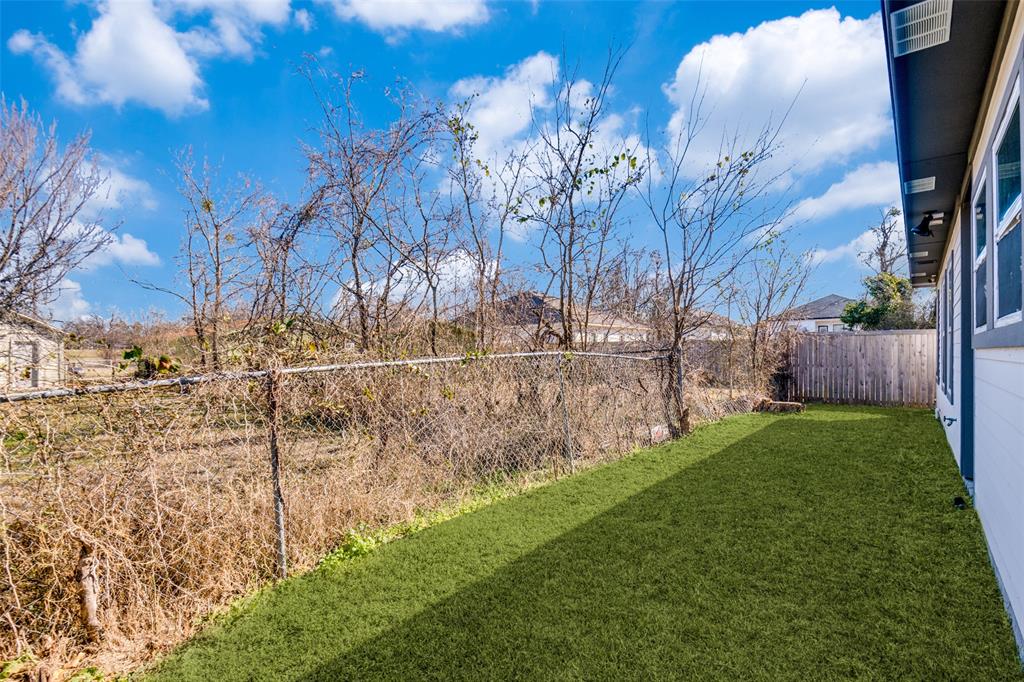 1205 Edgar Street Greenville, TX 75401 - Photo 25 of 26 a view of yard with tree