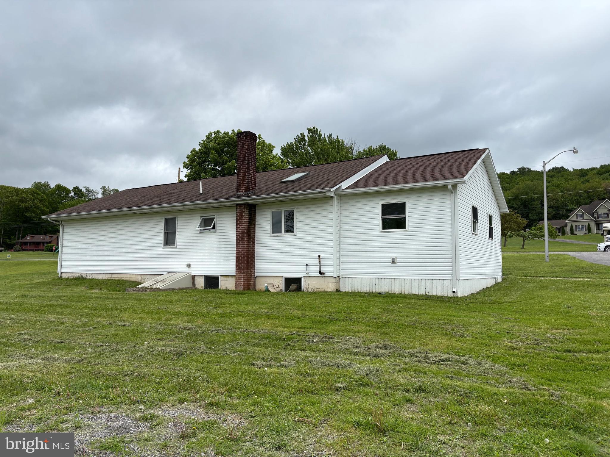 4319 Viola Pike Ramey, PA 16671 - Photo 19 of 23 a front view of a house with a garden