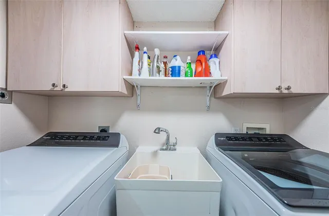 a room with lots of chairs and mirrors