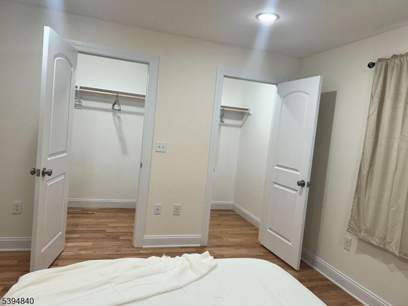 337 13th Avenue, Unit 1 Newark, NJ 07103 - Photo 12 of 14 a bathroom with a tub and shower