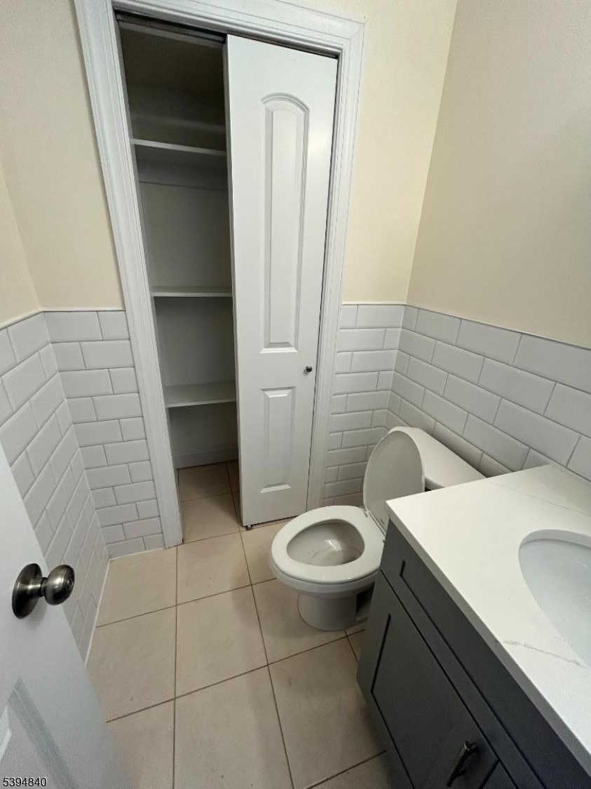 337 13th Avenue, Unit 1 Newark, NJ 07103 - Photo 13 of 14 a bathroom with a sink and toilet