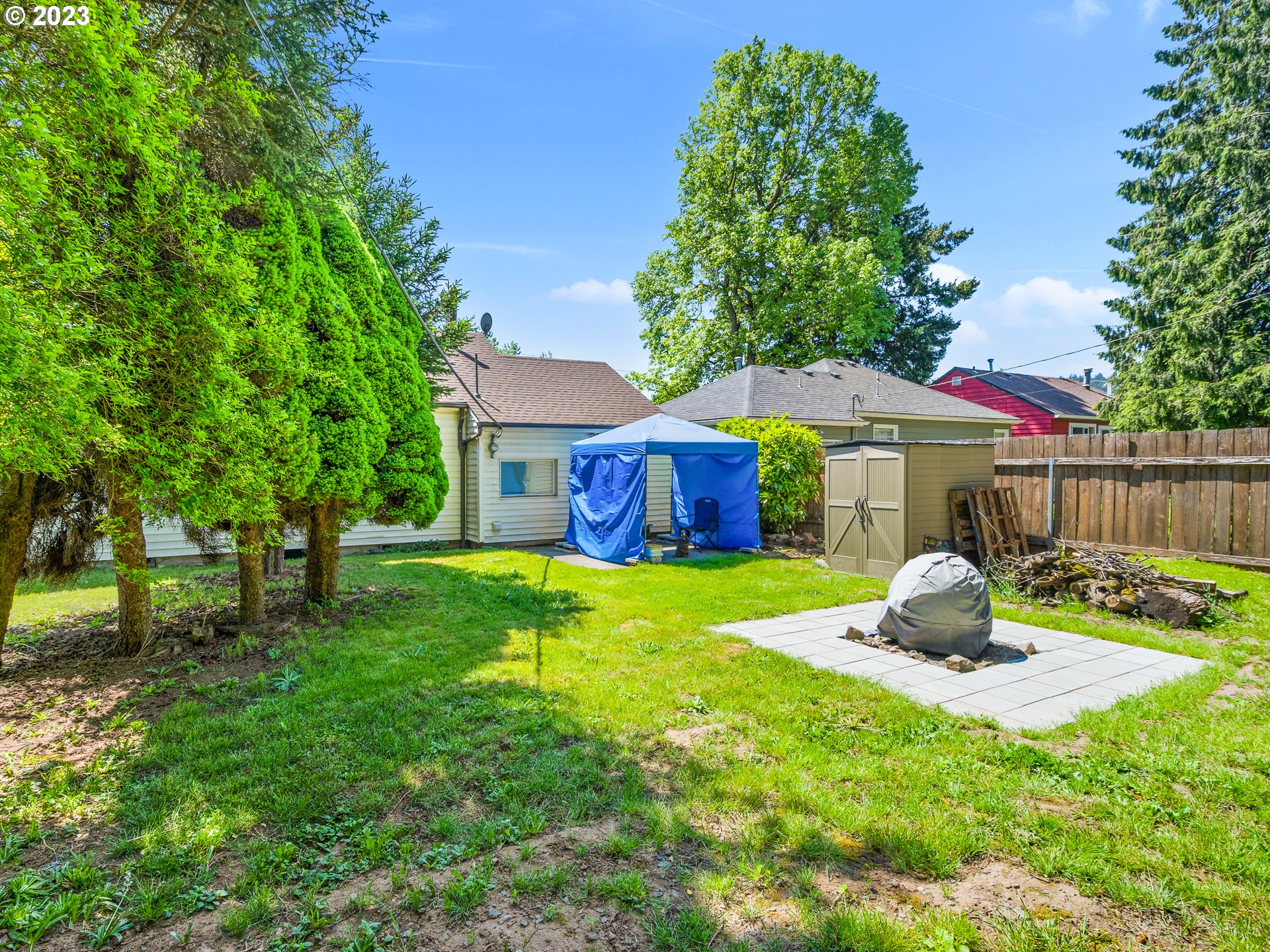 8445 Southeast Washington Street Portland, OR 97216 - Photo 4 of 17 a house view with sitting space and garden