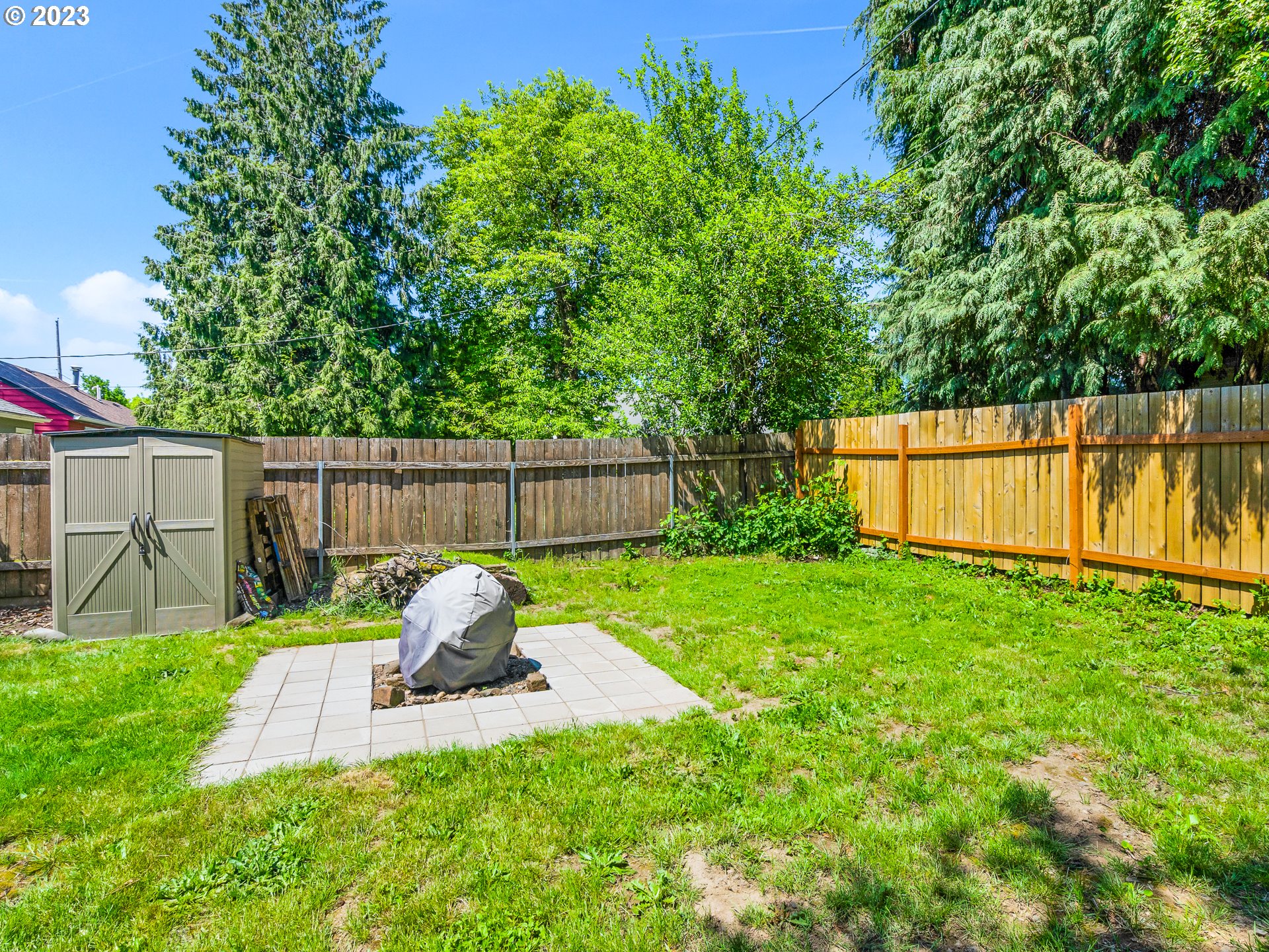 8445 Southeast Washington Street Portland, OR 97216 - Photo 5 of 17 a garden view with a seating space