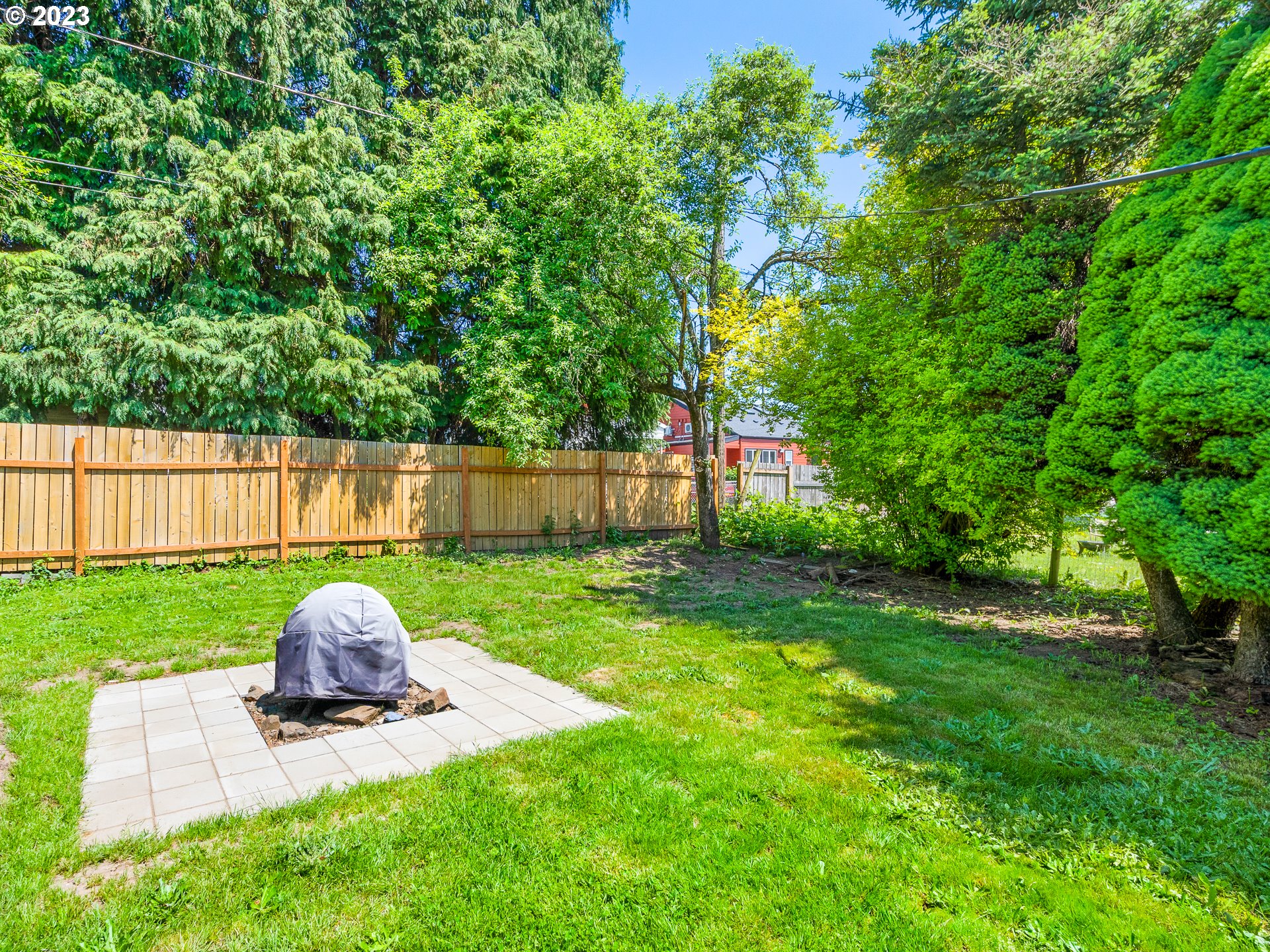 8445 Southeast Washington Street Portland, OR 97216 - Photo 6 of 17 a view of a garden with furniture and garden