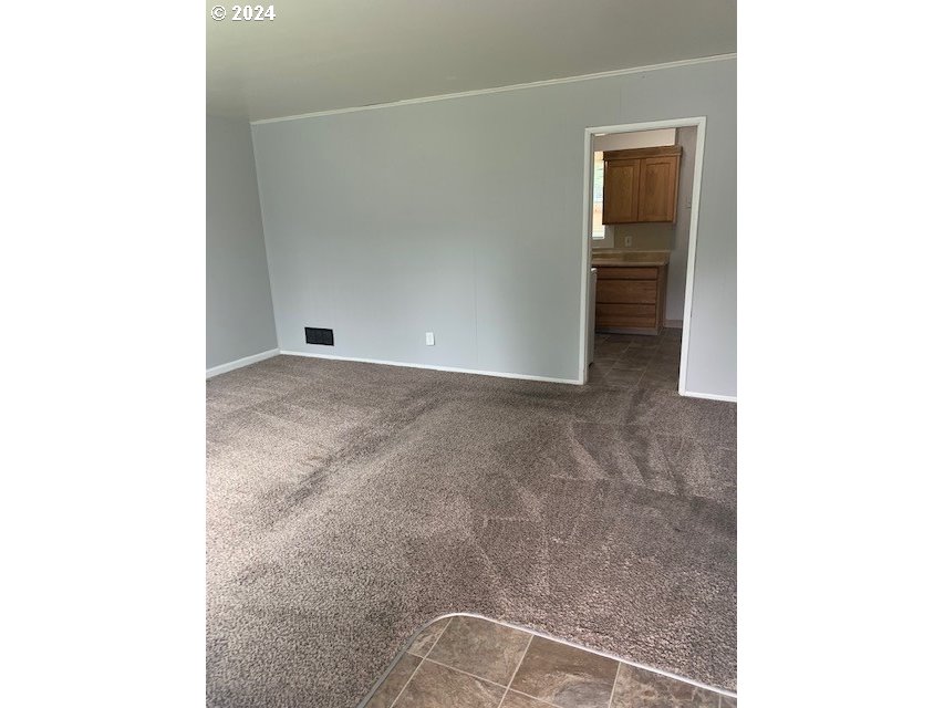 8445 Southeast Washington Street Portland, OR 97216 - Photo 9 of 17 a view of an empty room