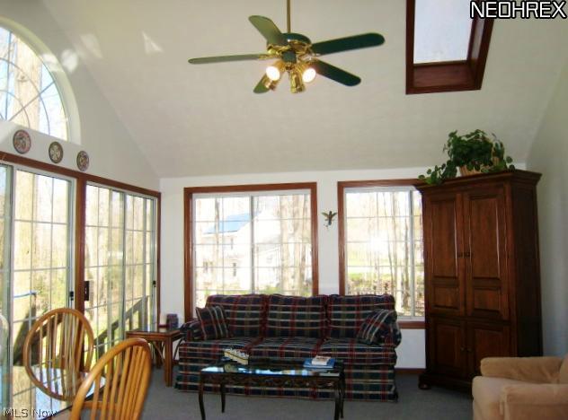 560 East Jackson Road Aurora, OH 44202 - Photo 13 of 25 Let the Sun Shine into the Vaulted Sun Room w/Skylights & Ceiling Fan. Circle Top Window Too!