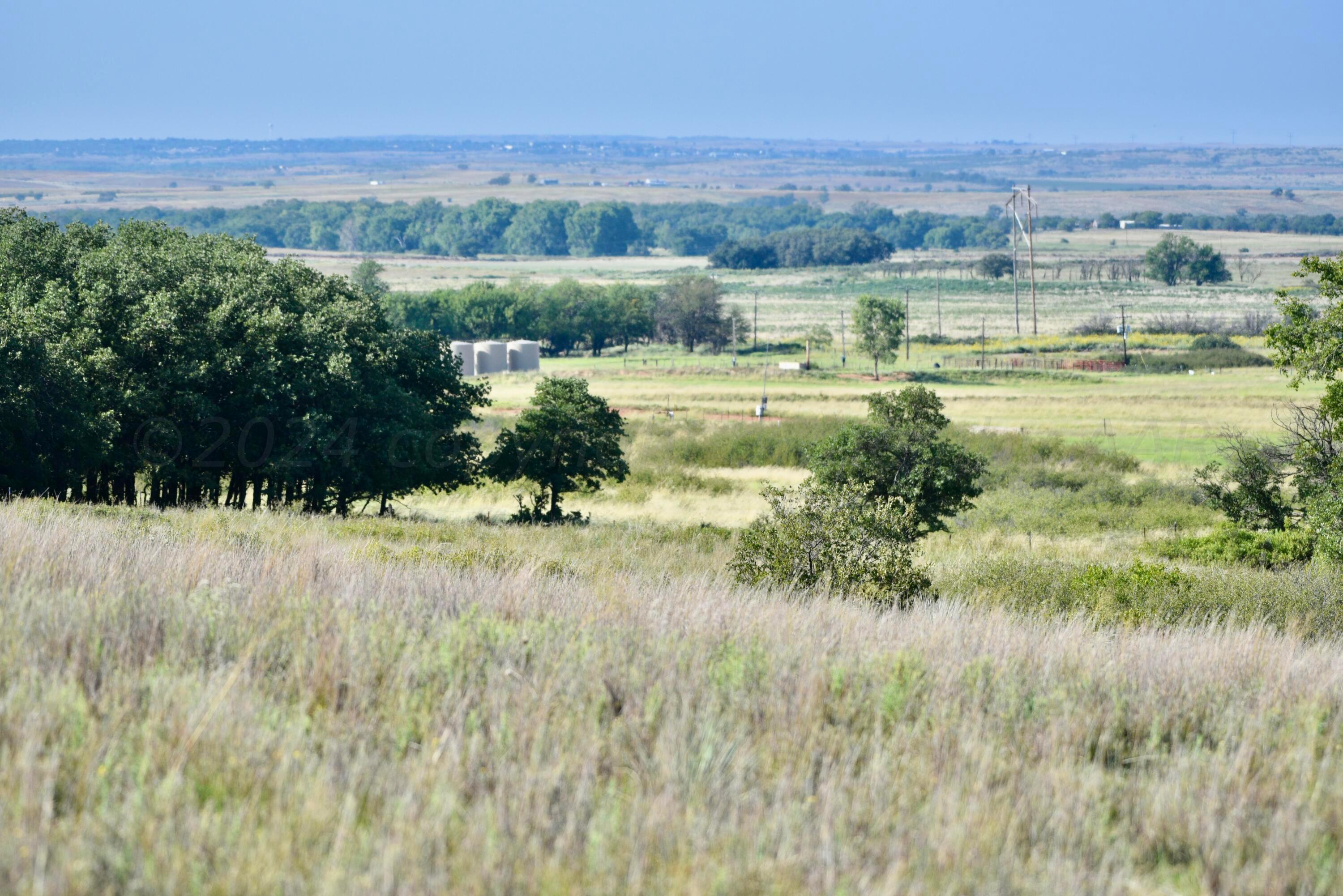 19 County Road 19 Wheeler, TX 79096 - Photo 50 of 57 a view of lake with green field