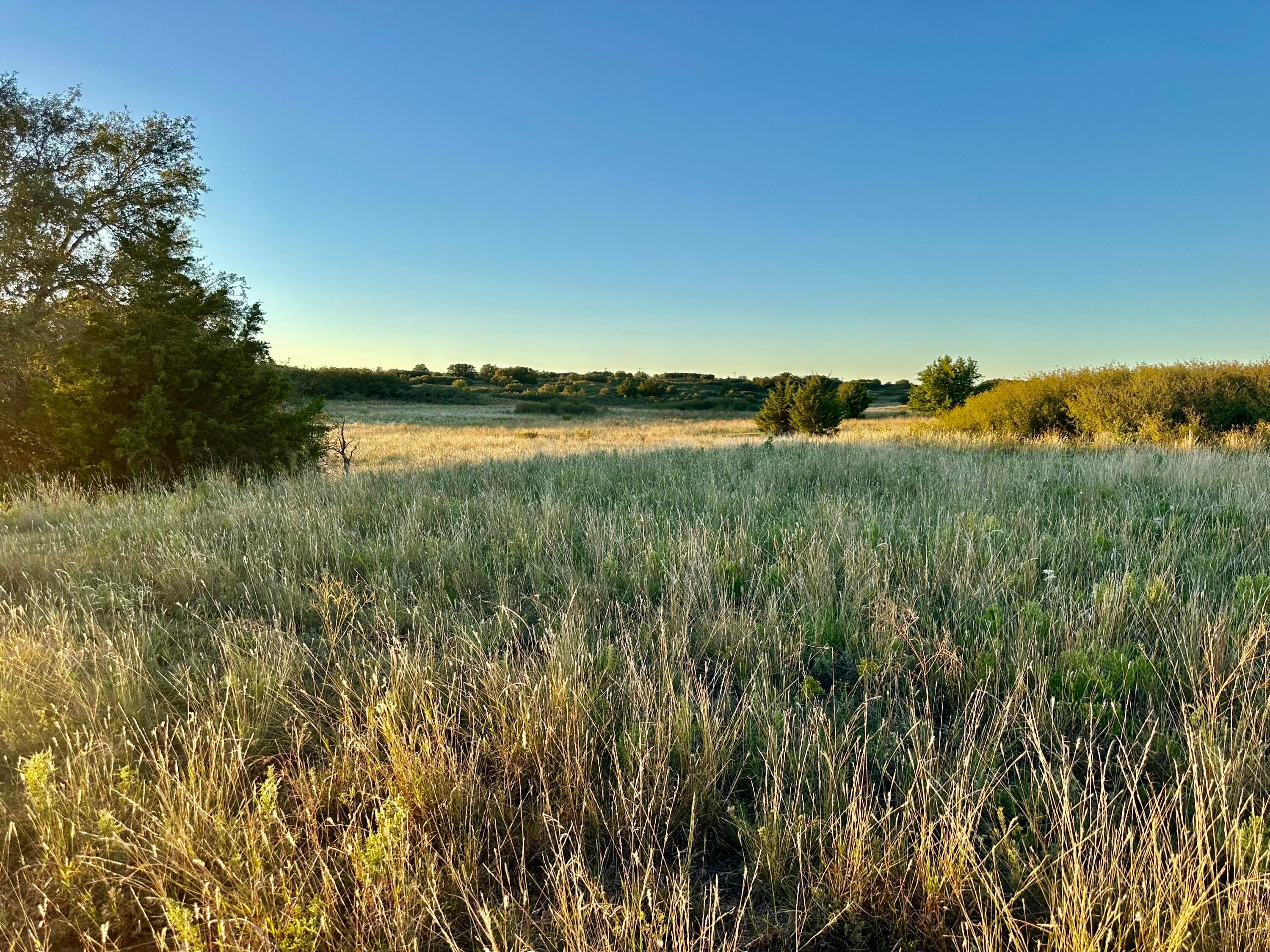19 County Road 19 Wheeler, TX 79096 - Photo 54 of 57 a view of a lake and green valley