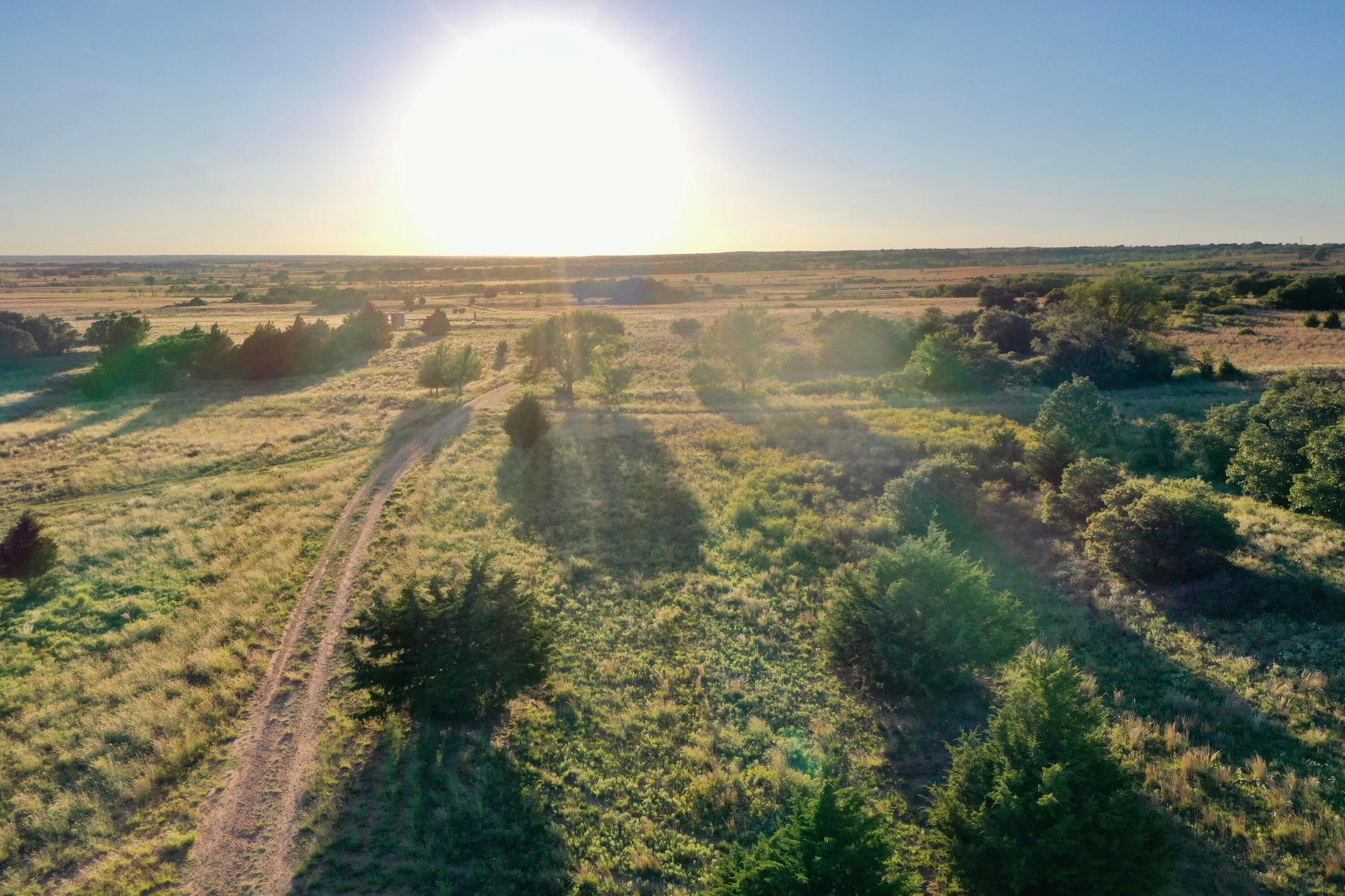 19 County Road 19 Wheeler, TX 79096 - Photo 7 of 57 an aerial view of residential building and lake