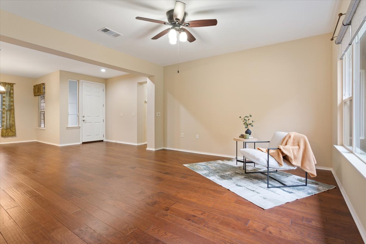 246 Red Poppy Trail Georgetown, TX 78633 - Photo 11 of 32 a view of a workspace with furniture and a window