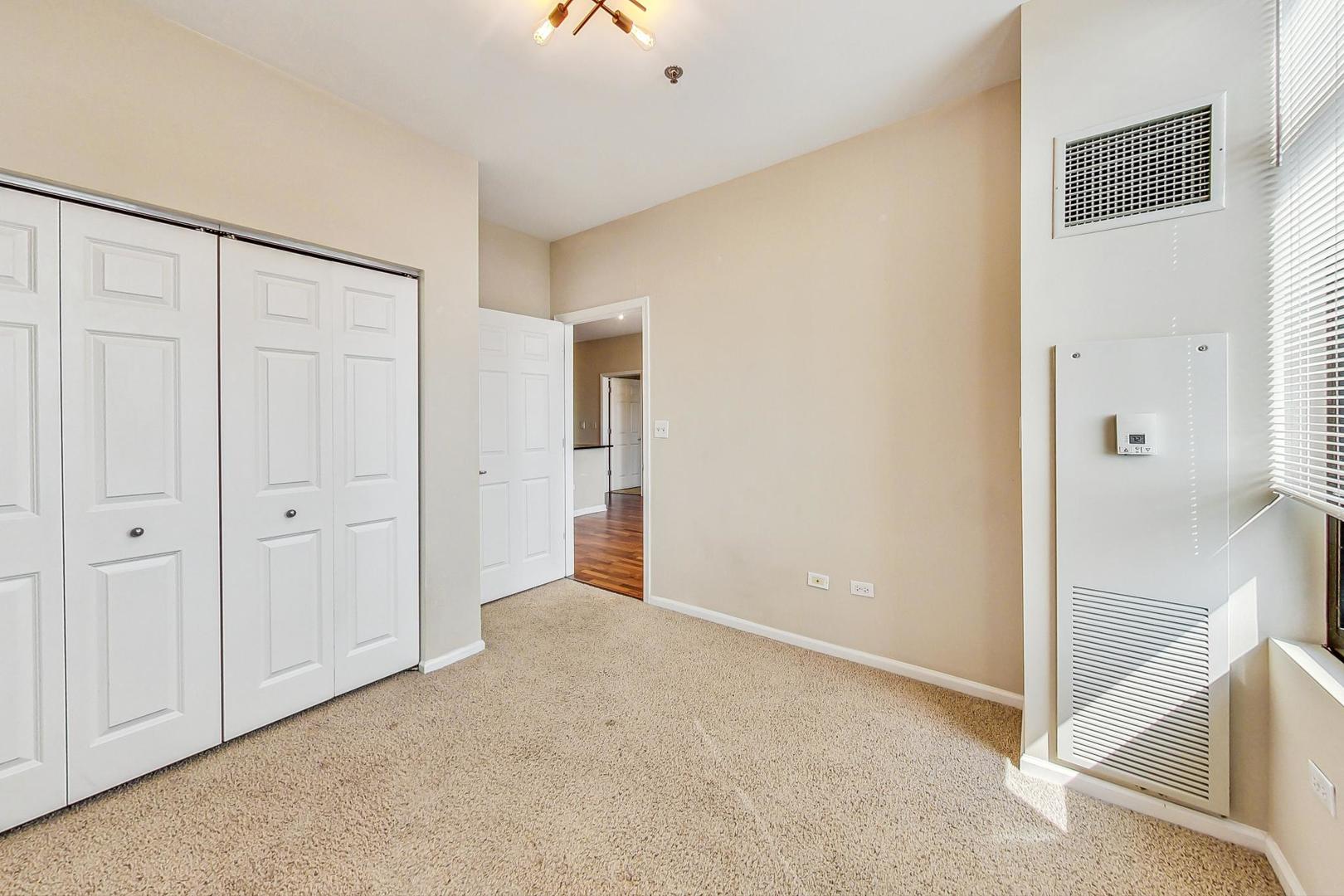 1255 South State Street, Unit 1918 Chicago, IL 60605 - Photo 10 of 16 a view of an empty room