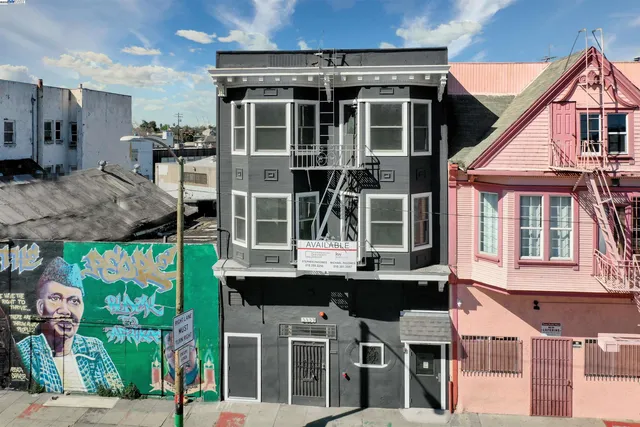 a view of a building with a window and porch