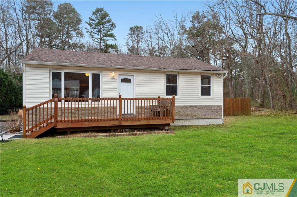 10 Soden Lane Old Bridge, NJ 08857 - Photo 1 of 20 a view of a house with a yard and deck