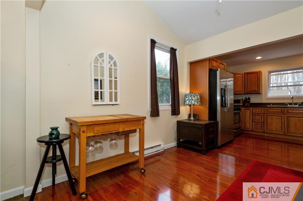10 Soden Lane Old Bridge, NJ 08857 - Photo 11 of 20 a view of a kitchen with furniture and a window