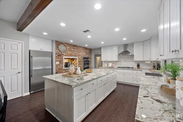 a kitchen with a stove and a sink