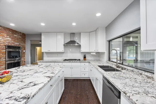 a reading room with furniture and a chair