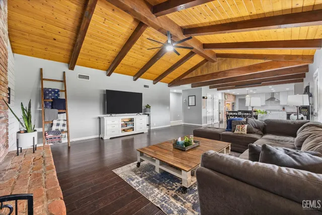 a bathroom with double sink and a mirror